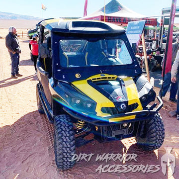 CANAM COMMANDER FRONT WINDSHIELD 2010-2020 'Dirt Warrior Accessories' branding at an outdoor event.