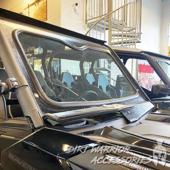 Close-up of a CANAM MAVERICK SPORT/TRAIL FRONT WINDSHIELD 2018+ with 'Dirt Warrior Accessories' branding.