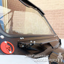 Close-up of a KAWASAKI TERYX KRX1000 FRONT WINDSHIELD 2020+ 'Dirt Warrior Accessories' branding.