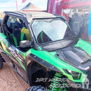 KAWASAKI TERYX KRX1000 FRONT WINDSHIELD 2020+ 'Dirt Warrior Accessories' branding at an outdoor event.