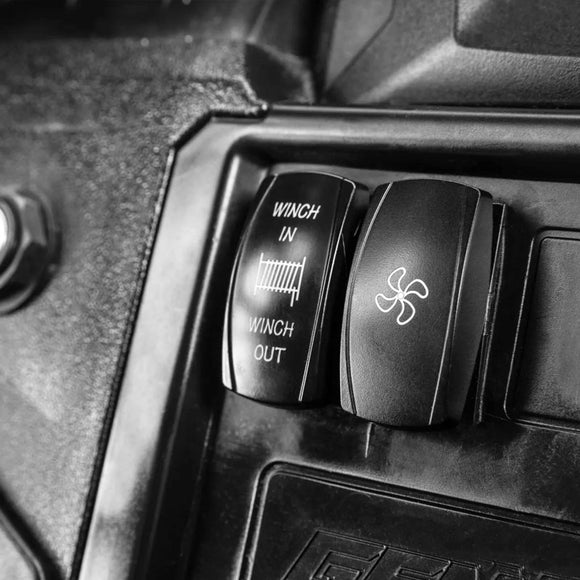 Close-up of POLARIS GENERAL 1000 IN-DASH HEATER control panel switches.