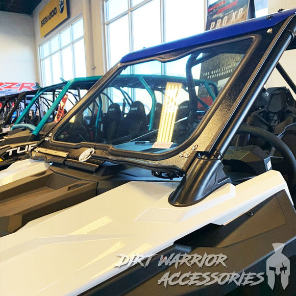 POLARIS RZR PRO XP FRONT WINDSHIELD 2019-24 'Dirt Warrior Accessories' branding in a showroom setting.
