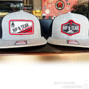 Two gray caps with 'Rip & Tear' logos 