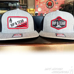 Two gray caps with 'Rip & Tear' logos 