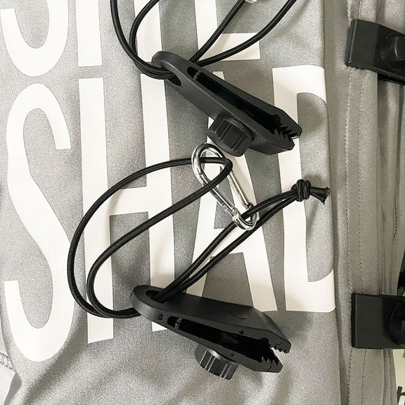 Close-up of Rage Shade - Site Shades carabiner with cords 