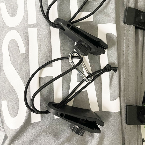 Close-up of Rage Shade - Site Shades carabiner with cords 